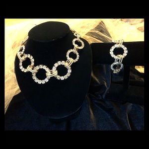 Gold rhinestone necklace and bracelet set.